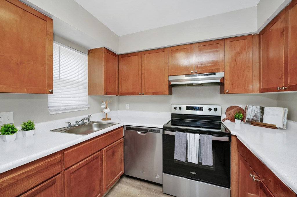 Kitchen with wood cabinets and stainless steel appliances
