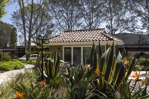 Leasing office with clay tile roof and succulent garden at Bella Del Mar Apartments, Del Mar, CA