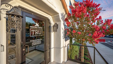 Front entrance with signage and landscaping at TRU Bankers Hill Apartments, California, 92101