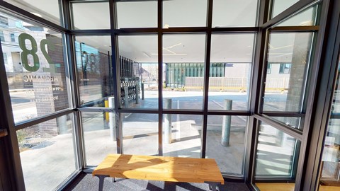 A view from inside a building looking out through a large window.