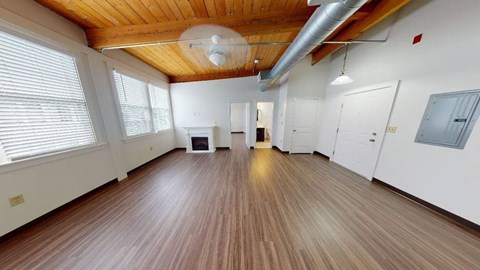 One bedroom one bathroom floorplan with fireplace at Emerson Shoe Lofts Apartments, Rockland, MA 02370