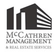 A black and white logo for McCarren Management & Real Estate Services.