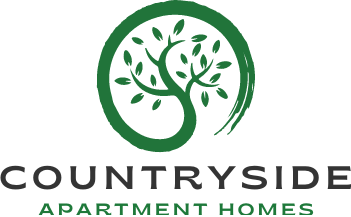 A logo for Countryside Apartment Homes featuring a tree.
