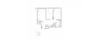 A floor plan of a room with a kitchen area and a bathroom.