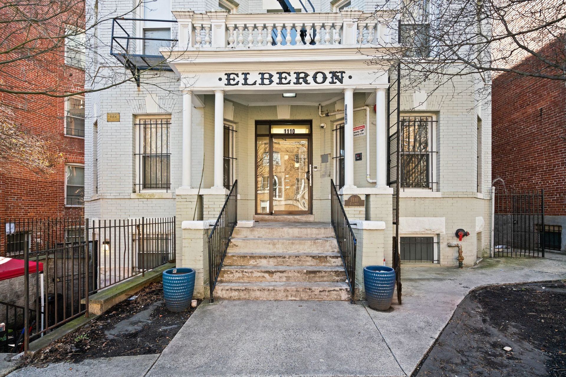A white building with the word "ELBERON" on the top.