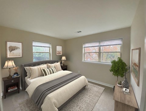 A bedroom with a large bed and a window.