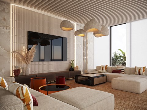 A modern living room with a flat screen TV mounted on the wall.
