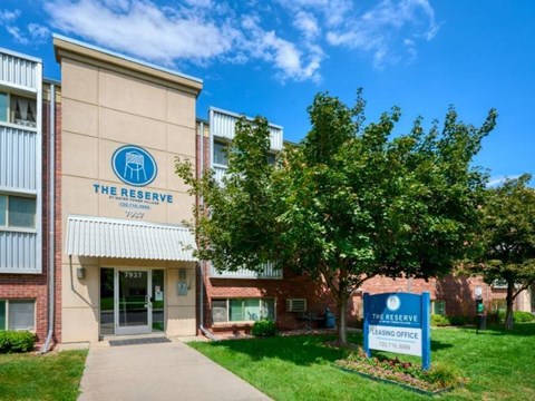 The Reserve Leasing Office is located in a building with a beige facade and a white awning.