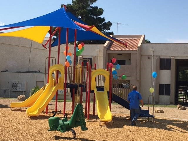 a child playing on a playground