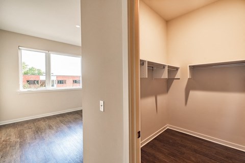 A room with a window and a door.