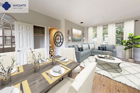A modern dining room with a wooden table set for two.