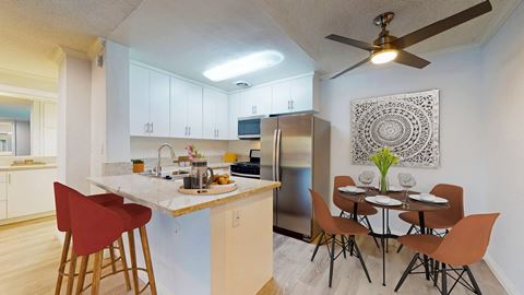 Kitchen and dining room in 2 bedroom apartment at Casa Granada Apartment Homes
