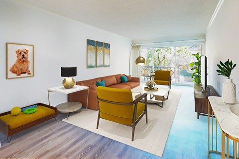 A living room with a yellow couch and a painting of a dog on the wall.