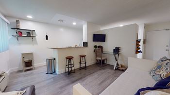 a living room with a bar and a couch at Villa Vicente, California, 90019