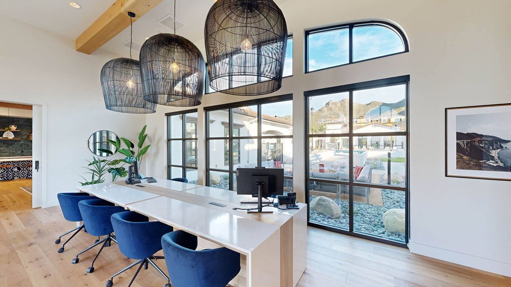 a conference room with a desk and chairs and large windows at The Villas at Anacapa Canyon, Camarillo, 93012