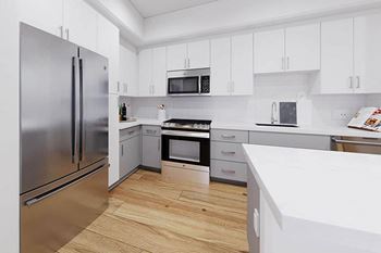 a kitchen with white cabinets and stainless steel appliances at Anacapa Canyon, Camarillo, 93012