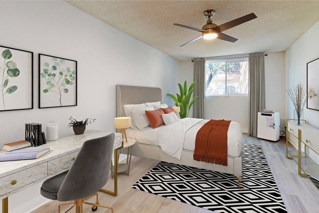 a bedroom with a bed and a ceiling fan at Casa Granada, California, 90049