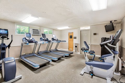 the gym has plenty of cardio equipment and treadmills at Casa Granada, Los Angeles, 90049