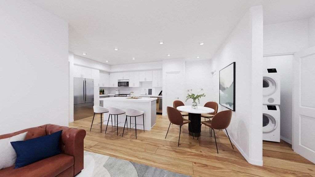 a living room and kitchen with a table and chairs at The Villas at Anacapa Canyon, Camarillo, 93012