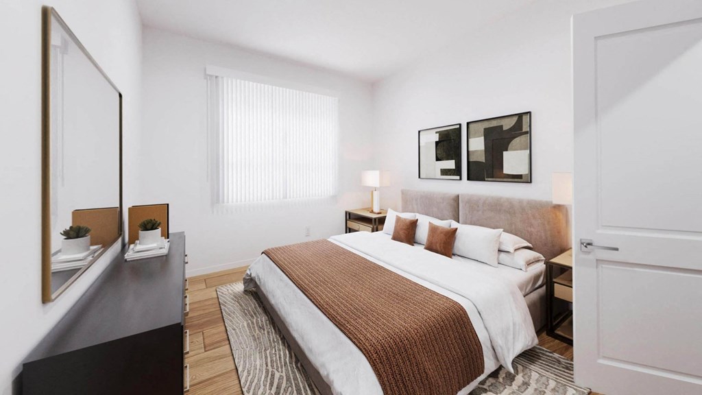 a bedroom with a bed and a large window at The Villas at Anacapa Canyon, Camarillo, California