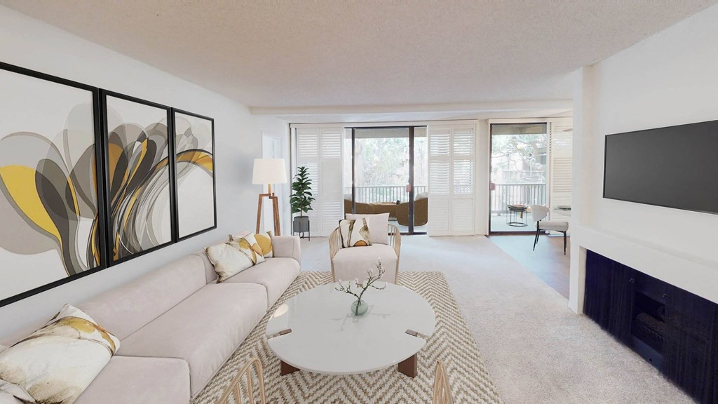 a living room with a white couch and a table and a television at Mariners Village, Marina del Rey, 90292