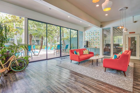 a living room with a couch and chairs and a patio  at Rancho Los Feliz, Los Angeles, CA, 90039
