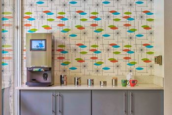 a small kitchen with a counter and a coffee machine  at Rancho Los Feliz, Los Angeles, CA, 90039