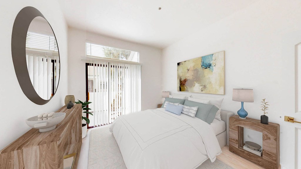 A bedroom with a balcony