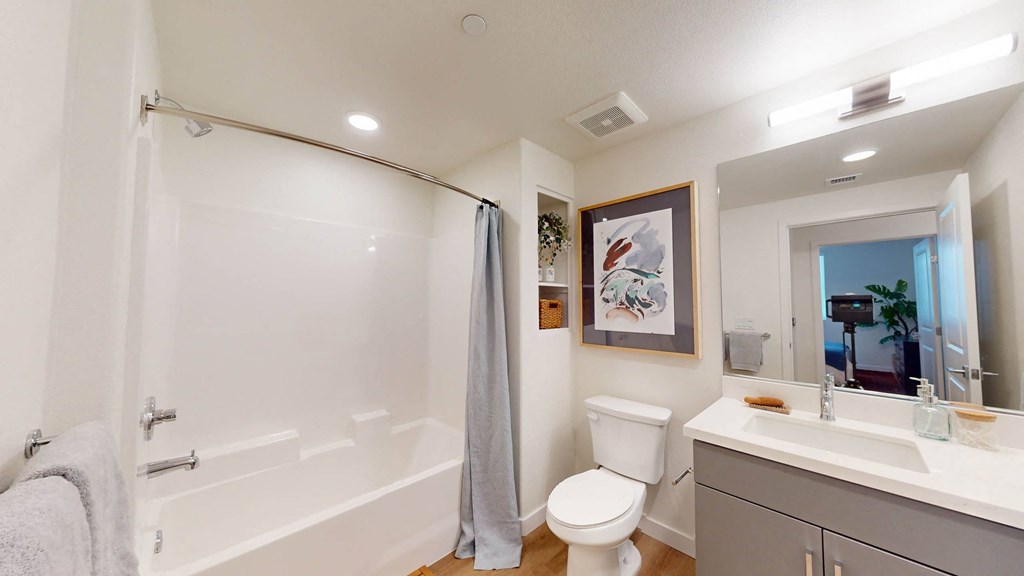 a bathroom with a shower and a toilet and a sink at The Villas at Anacapa Canyon, Camarillo, 93012