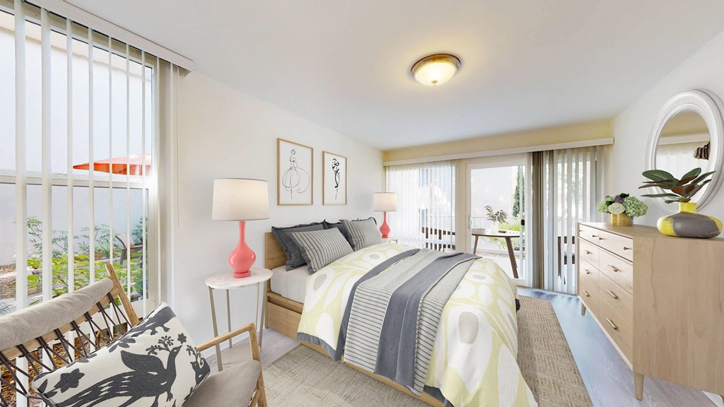 Two Bedroom Plan A - bedroom and balcony at West Park Village Apartment Homes