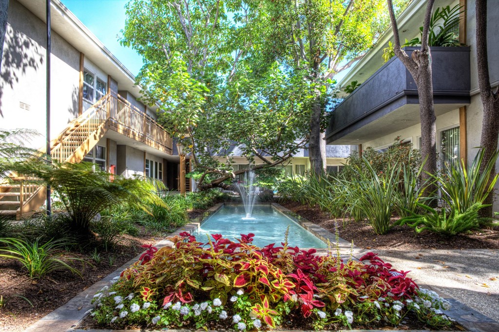 Landscaping and fountain at West Park Village Apartment Homes