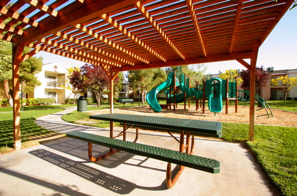 Picnic area and playground at Mountain Vista Apartment Homes