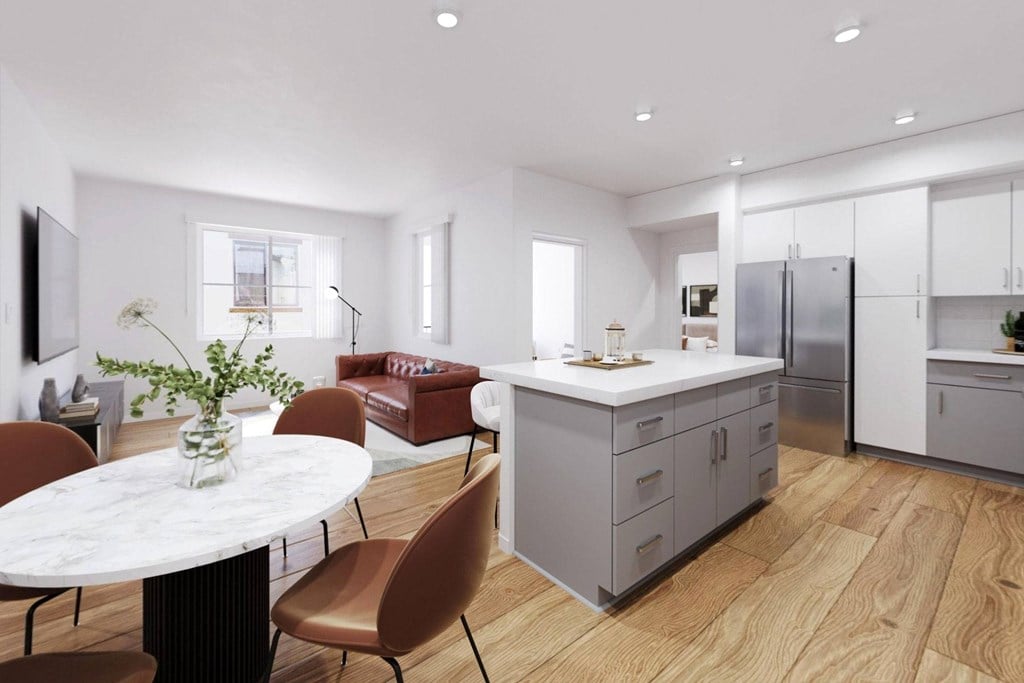 A modern kitchen with a dining table and chairs at The Villas at Anacapa Canyon, Camarillo, 93012