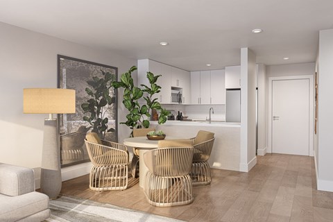 A modern dining room with a table set for four.