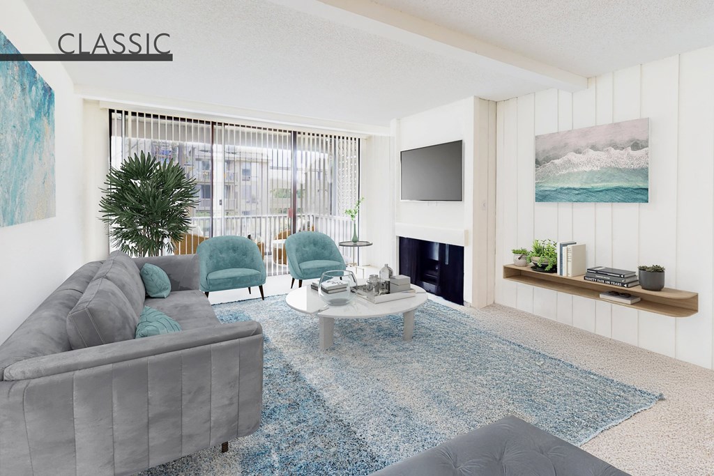 A living room with a grey couch and a blue rug at Mariners Village, Marina del Rey, 90292