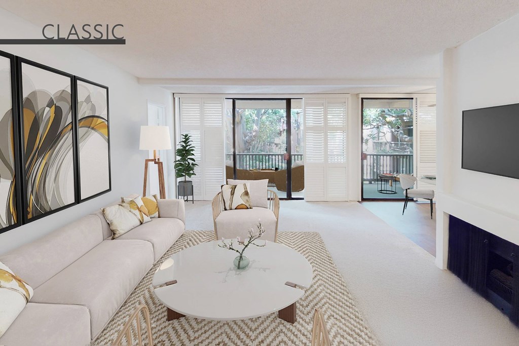 A living room with a white couch and a coffee table at Mariners Village, Marina del Rey, 90292