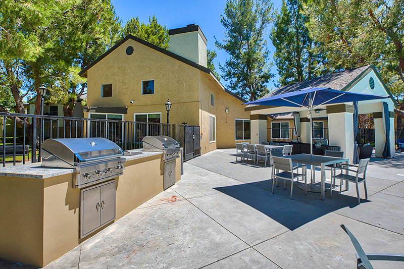 BBQ area near pool at Mountain Vista Apartment Homes