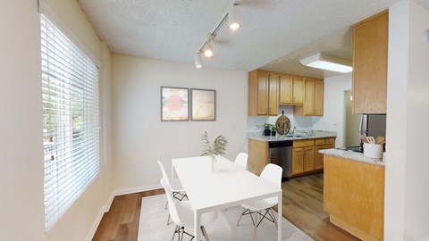 Dining area and kitchen at Pleasanton Glen Apartment Homes