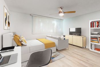 A modern bedroom with a bed, chair, and a laptop at Casa Granada, California, 90049