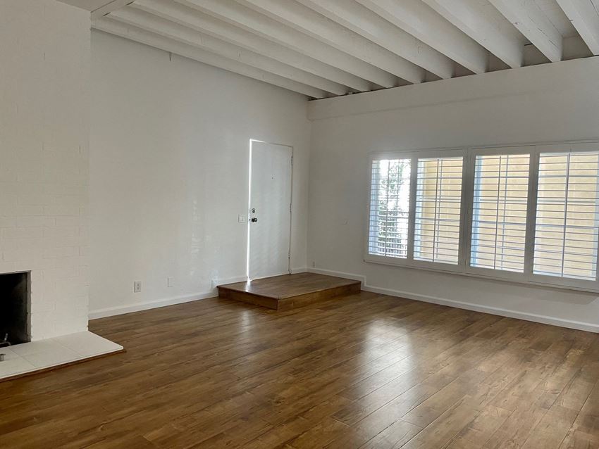 Living Room with Hardwood Floors and Fireplace - Photo Gallery