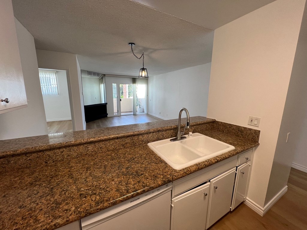Kitchen with White Appliances and White Cabinets
