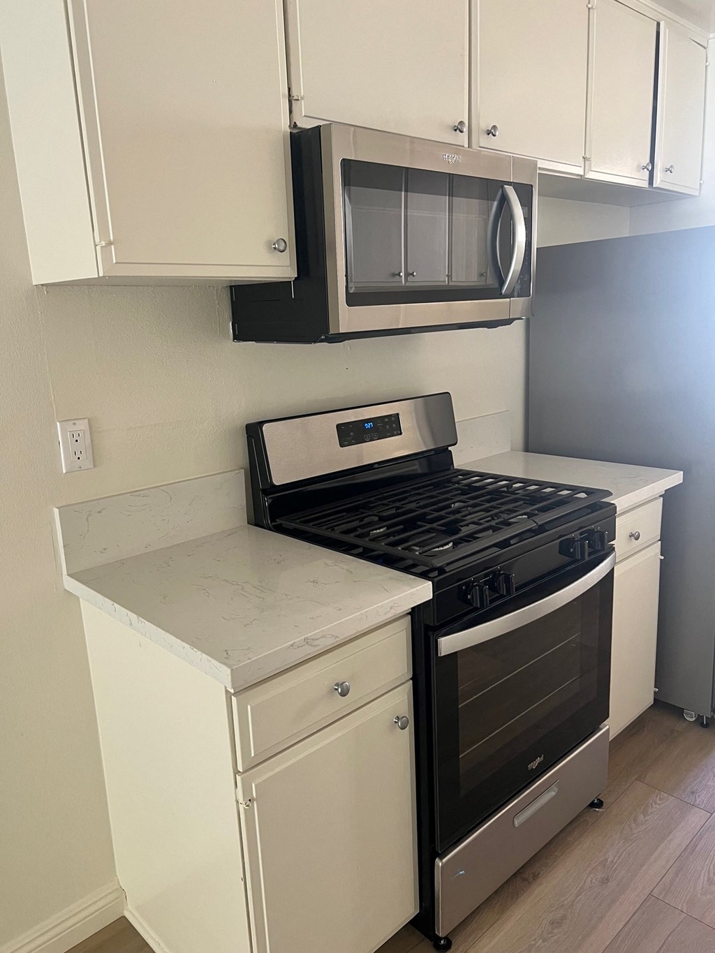 Kitchen with Stainless Steel Appliances and White Cabinets