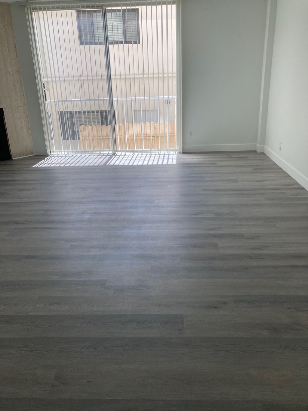 Living Room with Hardwood Floors and Patio Door