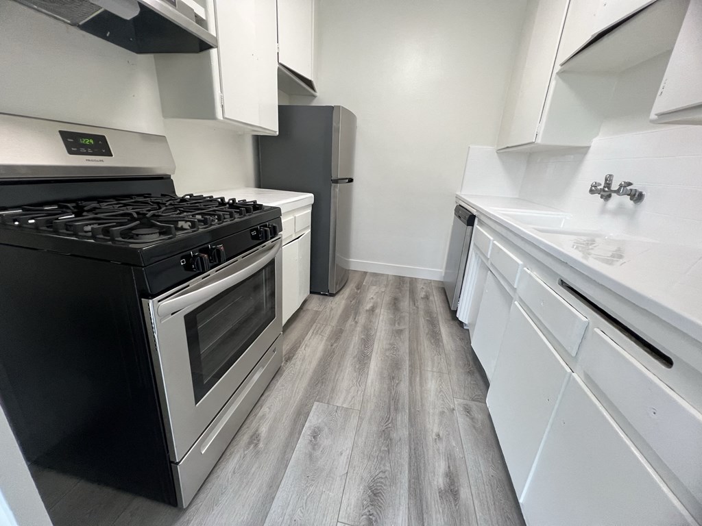 Kitchen with Stainless Steel Appliances and White Cabinets