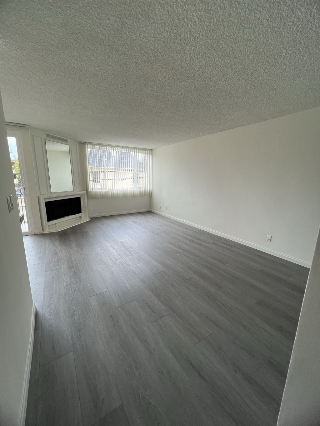 Living Room with Hardwood Floors and Fireplace