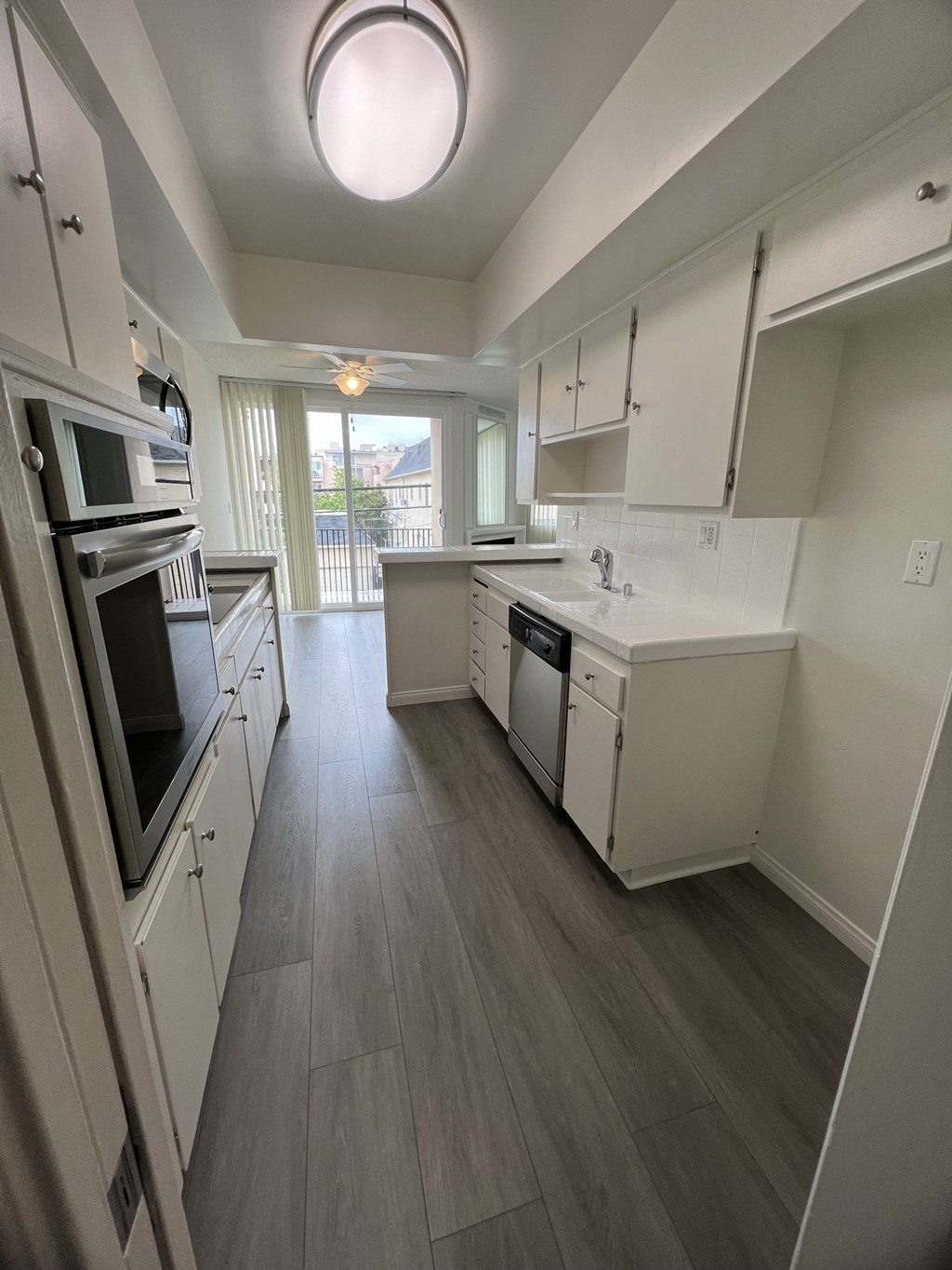 Kitchen with Stainless Steel Appliances and White Cabinets