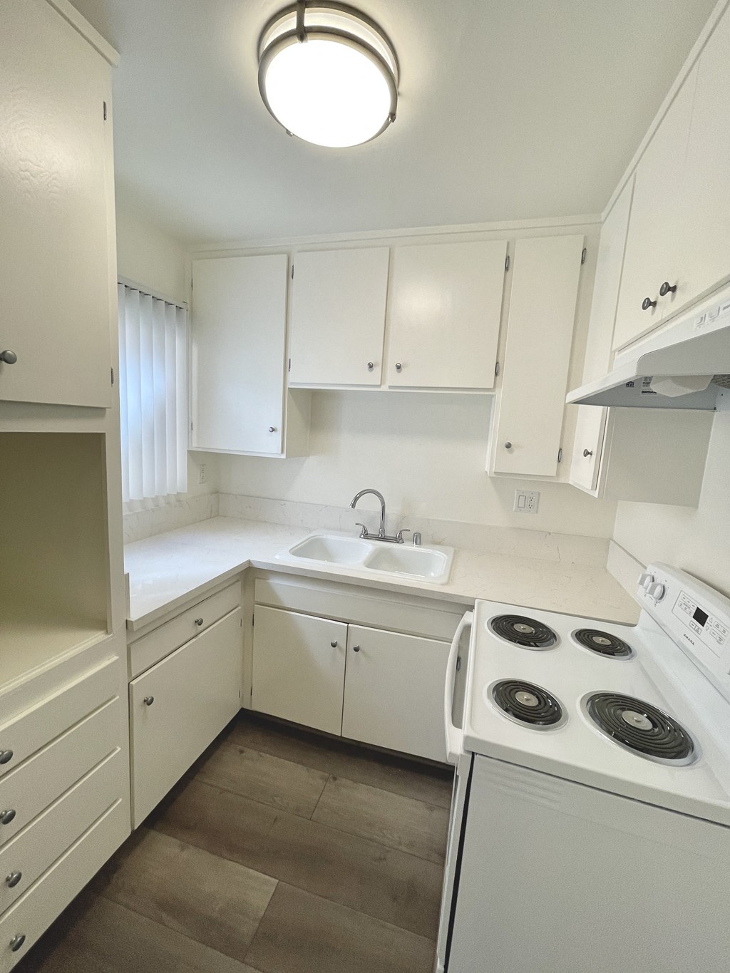 Kitchen with White Appliances and White Cabinets