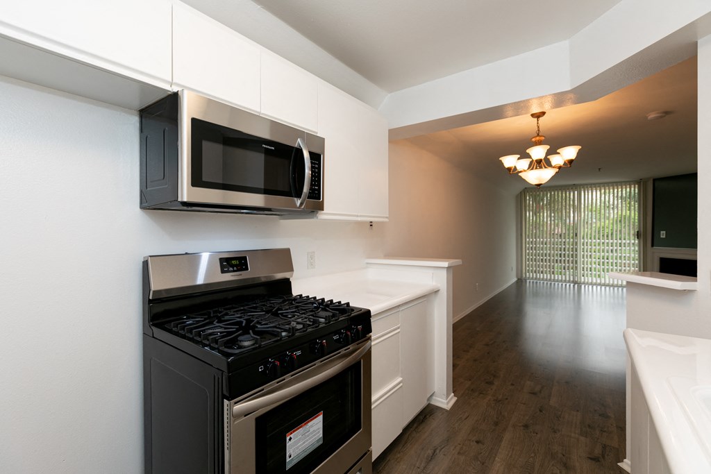Kitchen with Stainless Steel Appliances and White Cabinets
