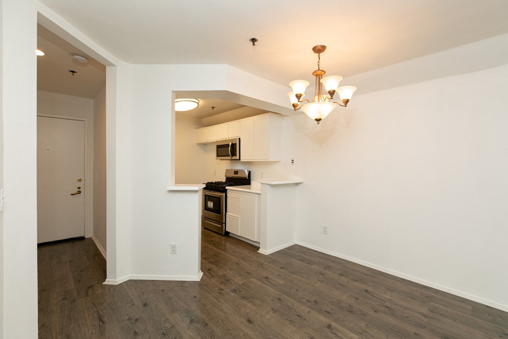 Dining Room with Hardwood Floors and Chandelier