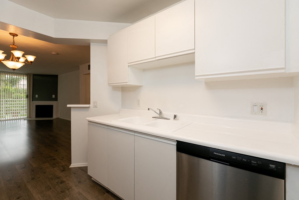 Kitchen with Stainless Steel Appliances and White Cabinets